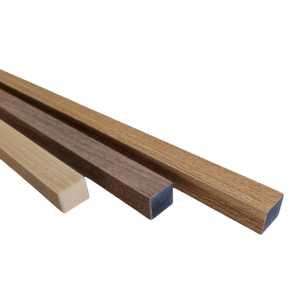 https://cdn.shopify.com/s/files/1/0549/6320/8418/files/Baguette_de_finition_noyer_woodvibe_acoupanneau_tassaeau.png?v=1656453439